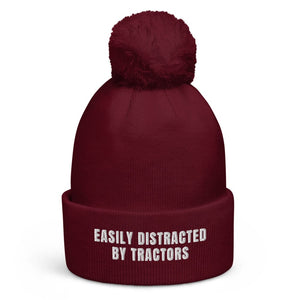 The Tractor Mugs Store Burgundy Easily Distracted By Tractors | Pom-Pom Beanie Quality Farmers Merch