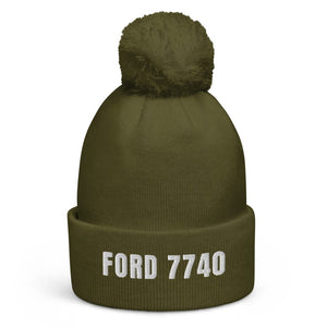 The Tractor Mugs Store Moss Green Ford 7740 | Pom-Pom Beanie Quality Farmers Merch